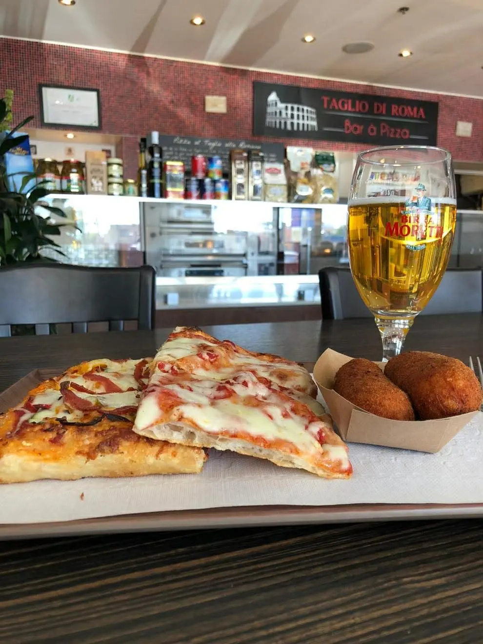 Arancini et supplis — Taglio di Roma